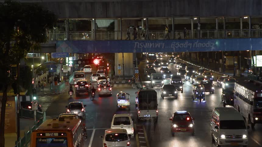 The roads are packed with traffic in the city at night