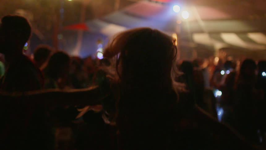 People are dancing, and having fun at the club