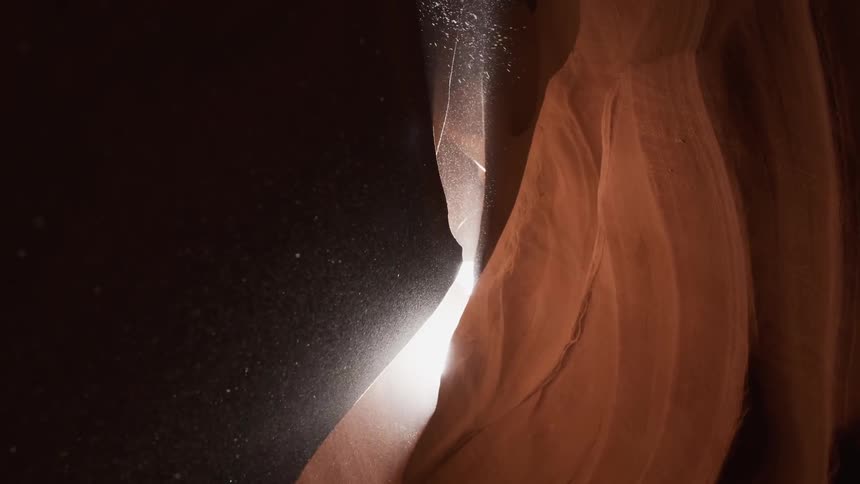 Dirt falls into the cave from above