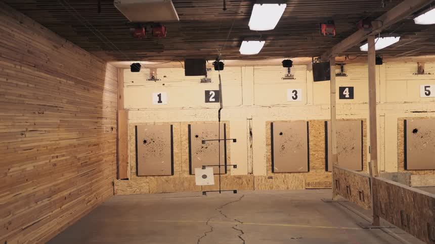 The target moves down the line in the range hitting the wall