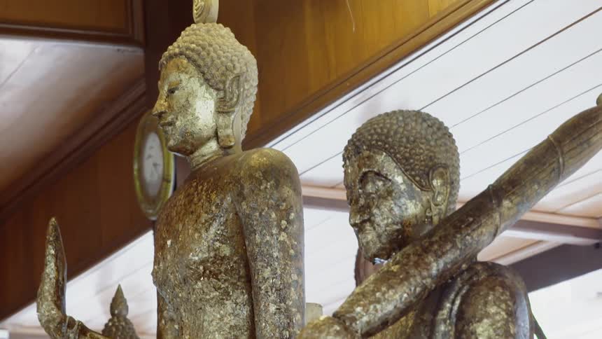 Two statues inside a museum