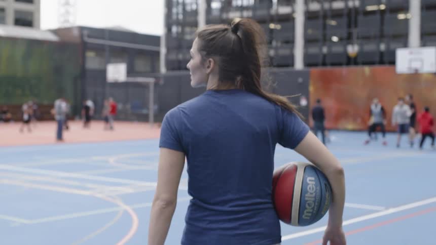 Women Playing Basketball On Outdoor Court