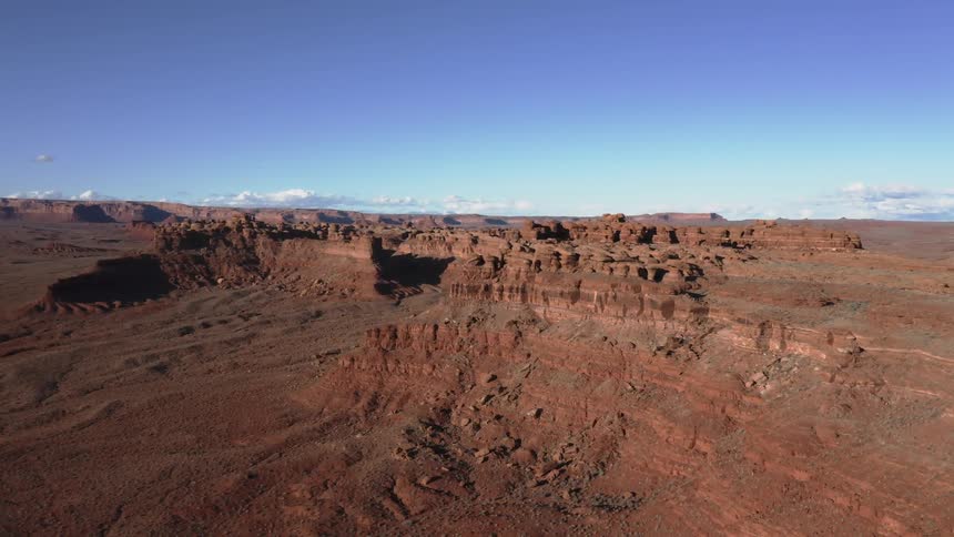 Wide aerial view of red desert landscape