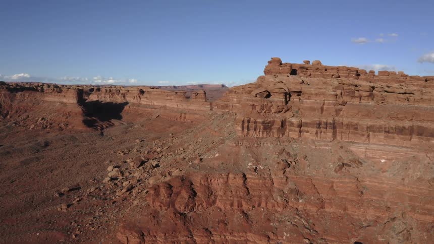 Aerial of vast desert landscape with red rocks