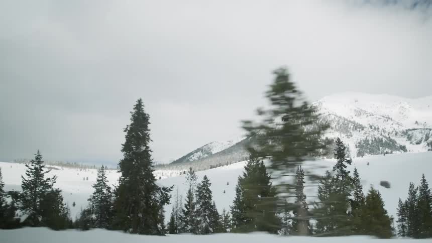 The mountain is covered with heavy snow
