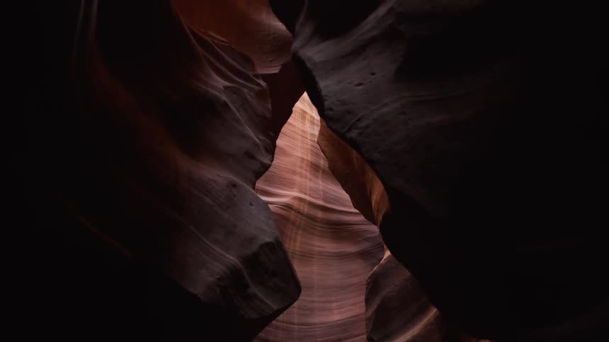 The sun is peeking into the cave from above