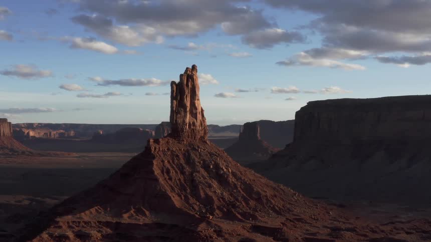 Aerial of desert valley and large rock formations
