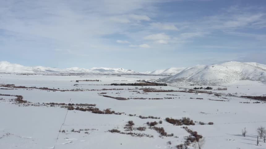 Aerial view of snow covered valley