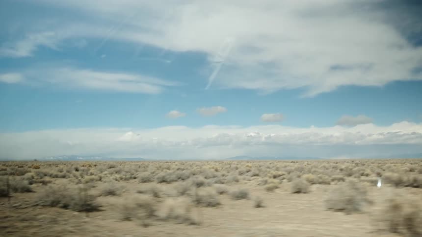 The desert is long and covered with bushes