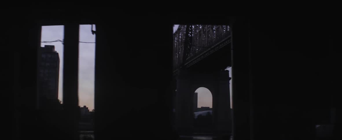 View of a bridge from a train window