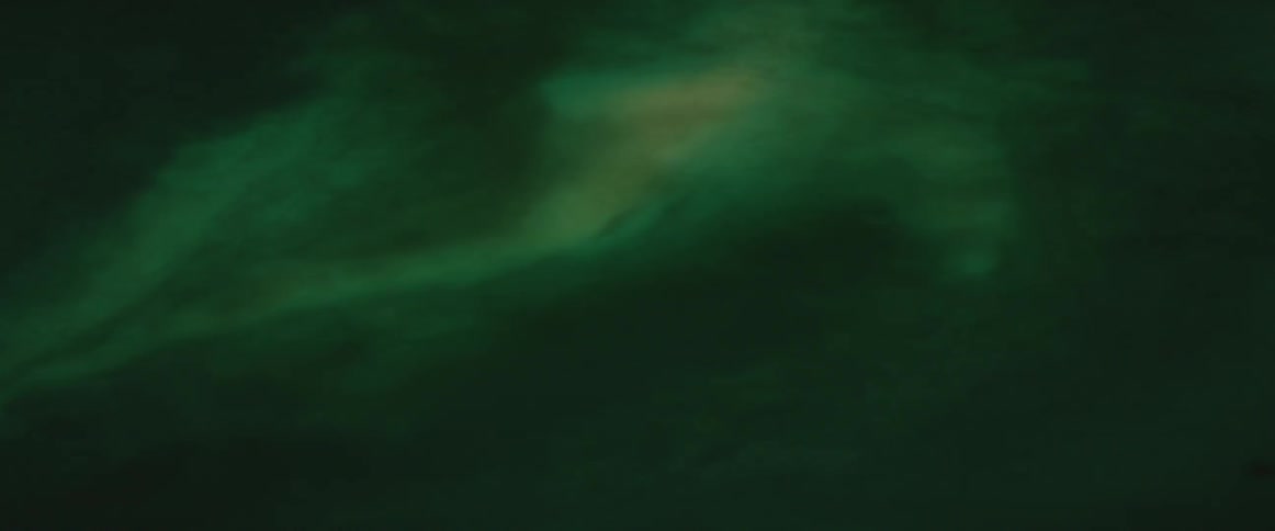 Green fog in a dark area