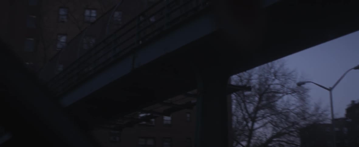 A bridge in a city at night