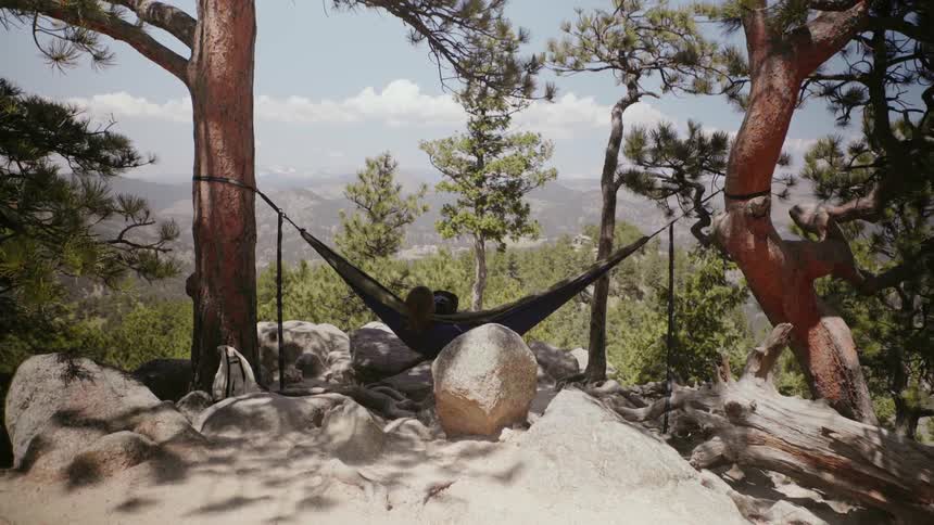 Woman Hammocking With Dog
