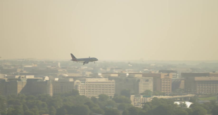 An airplane lands in washington dc