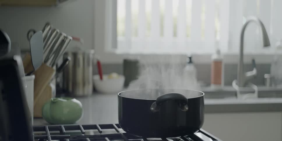 Water boils on a stovetop
