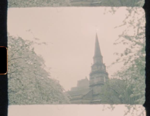 A church steeple towers into the sky