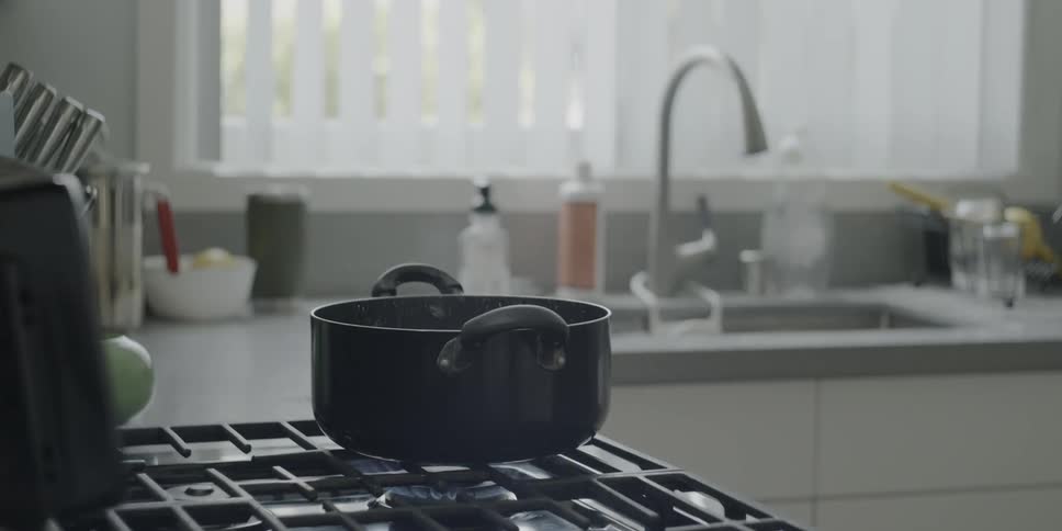 Water boils on a stovetop