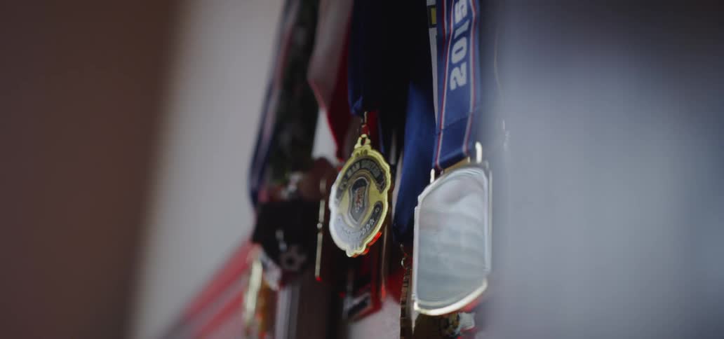 Medals hang on a wall