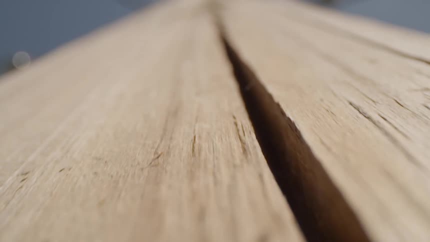 Large crack sits in the long piece of wood