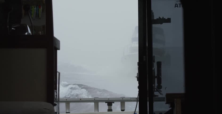 A ship sails on an ocean