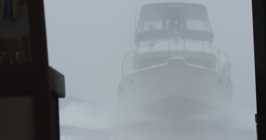Large boat travels over the rough water