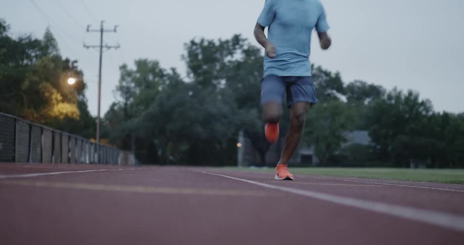 Man runs along a track