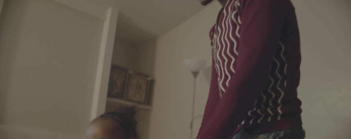 Man and young toddler play in the living room