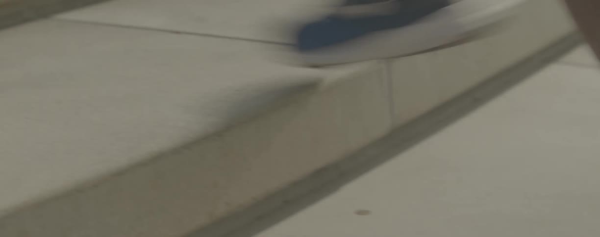 Person is running up and down on outside concrete steps