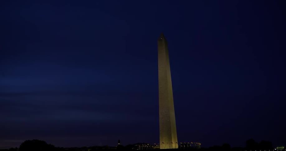 Washington monument lit up at night