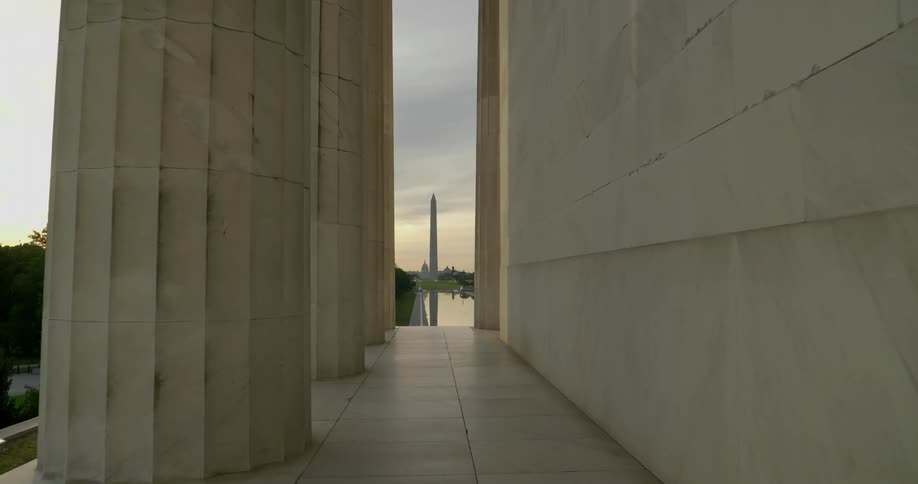 The sun sets over the national mall in washington dc