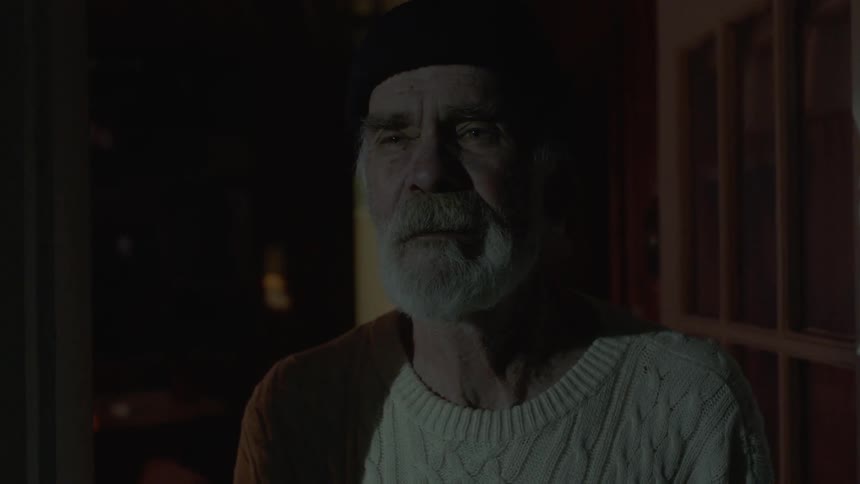 Elderly Man Living In Cabin
