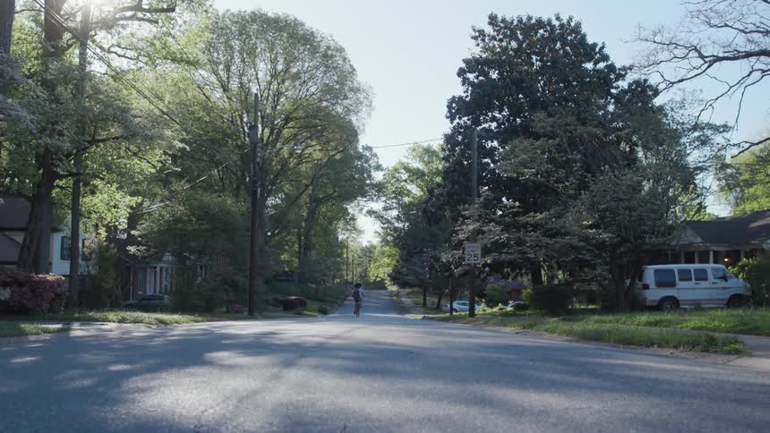 A person is riding their bicycle on the street