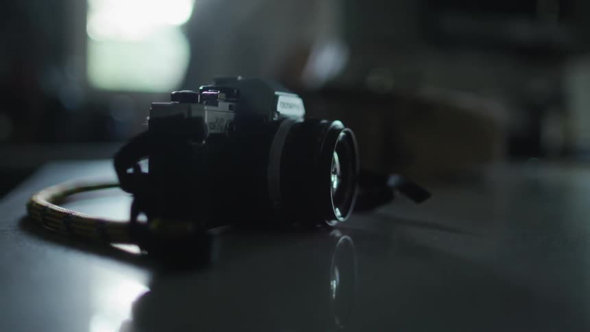 A camera sits on the kitchen counter