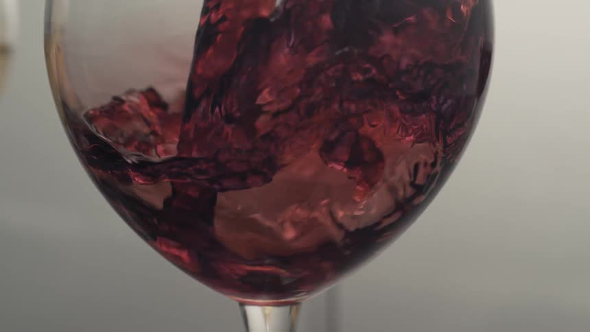 Wine being poured into a wine glass
