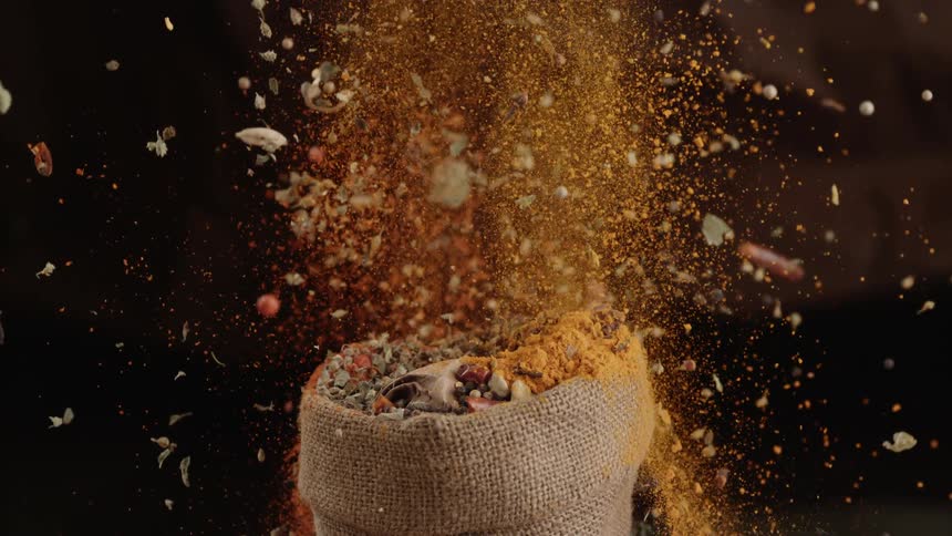Mix of spices burst out of sack