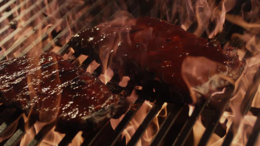 Barbeque ribs on firey grill