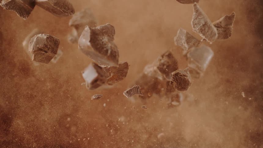 Chocolate and cocoa powder explodes into the air