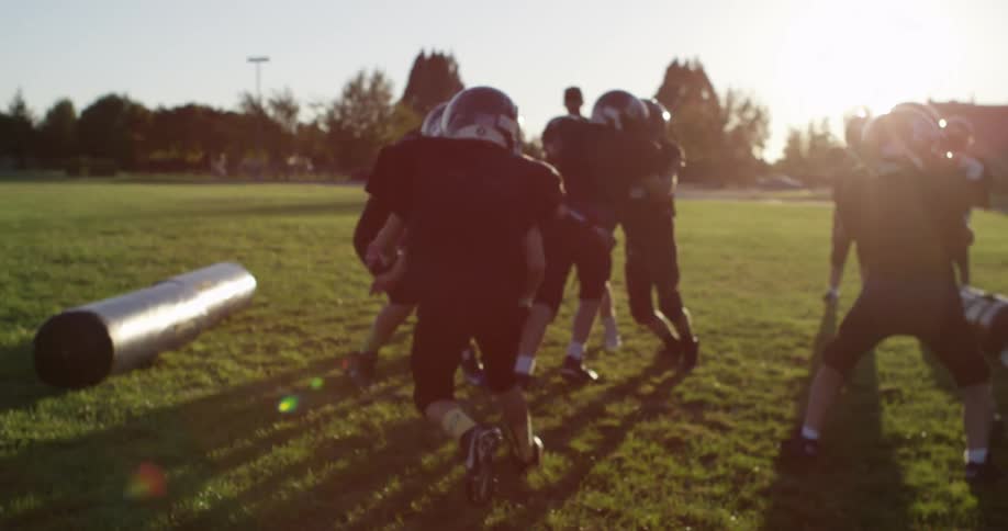 Kids playing american football