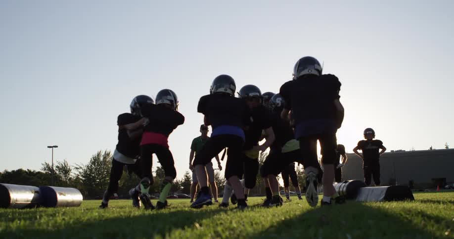 Kids playing american football