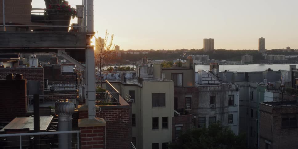 The sun shines on city buildings