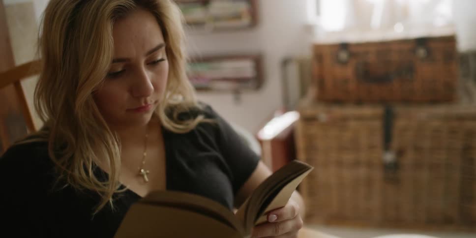 A woman reads a book