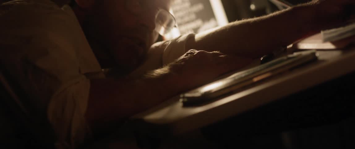 A man who fell asleep at his desk jolts awake