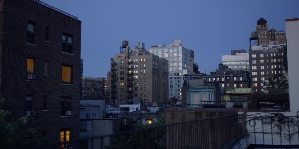 Buildings stand in a city at night