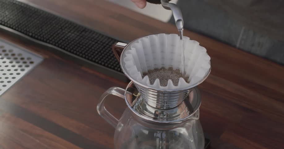 Hot water is poured over a coffee filter