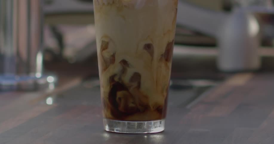 A large glass is full on the table