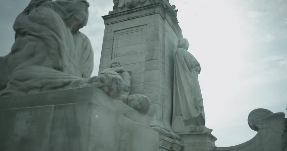 Statues sit atop the stairs