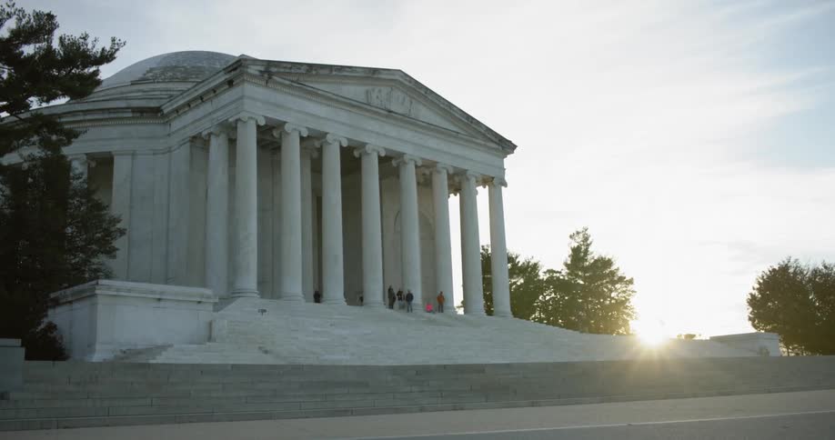 People stand on the steps of the Jefferson Memorial in Washington DC