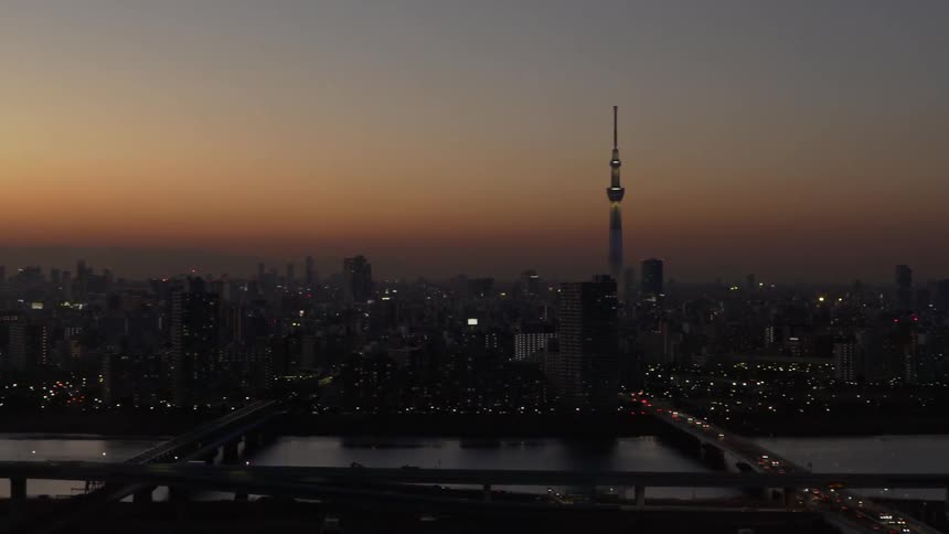 The city of Tokyo approaches dusk after sunset