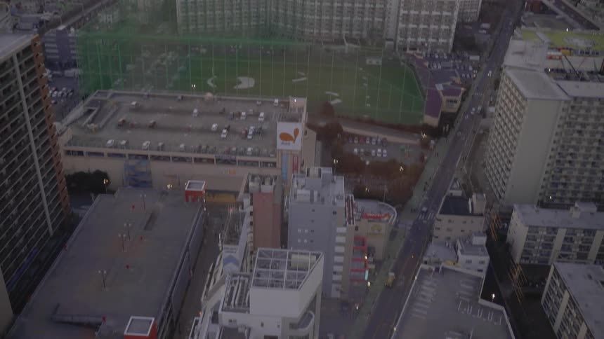 The city is busy with vehicles and traffic