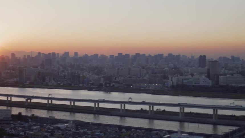 The sun shines on the city skyline